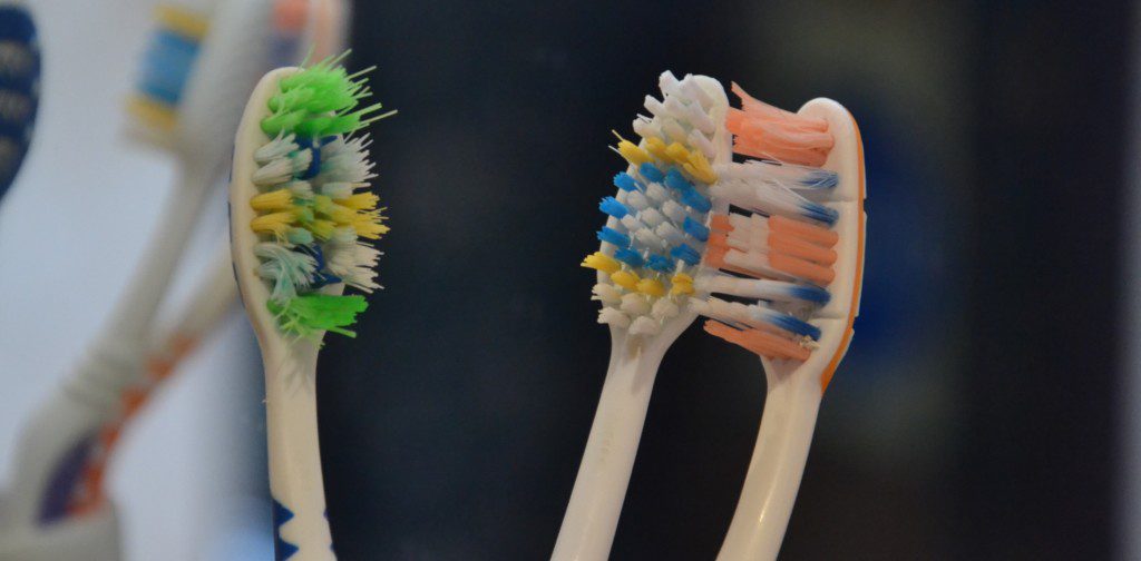 used toothbrush poor oral hygiene halitosis